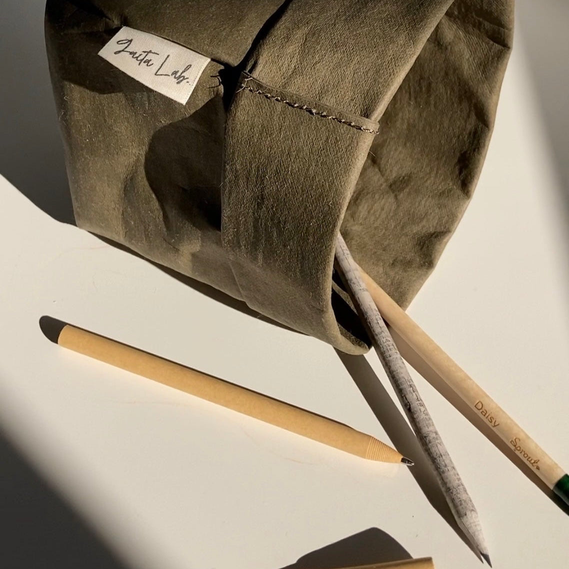 Small washable paper baskets in deep olive used for pens and pencils – Gaita Lab